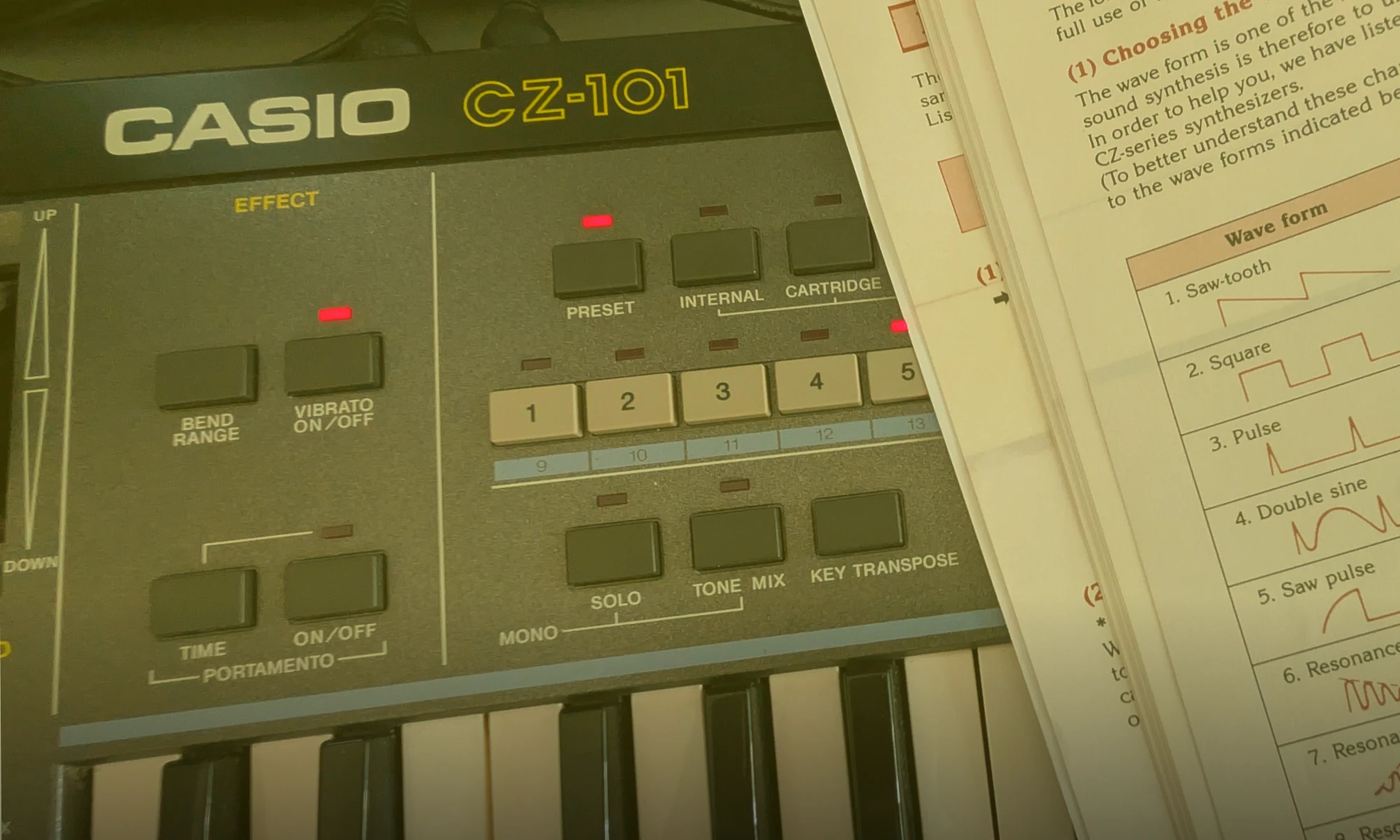 Casio CZ-101 keyboard with a document on a DAW desk